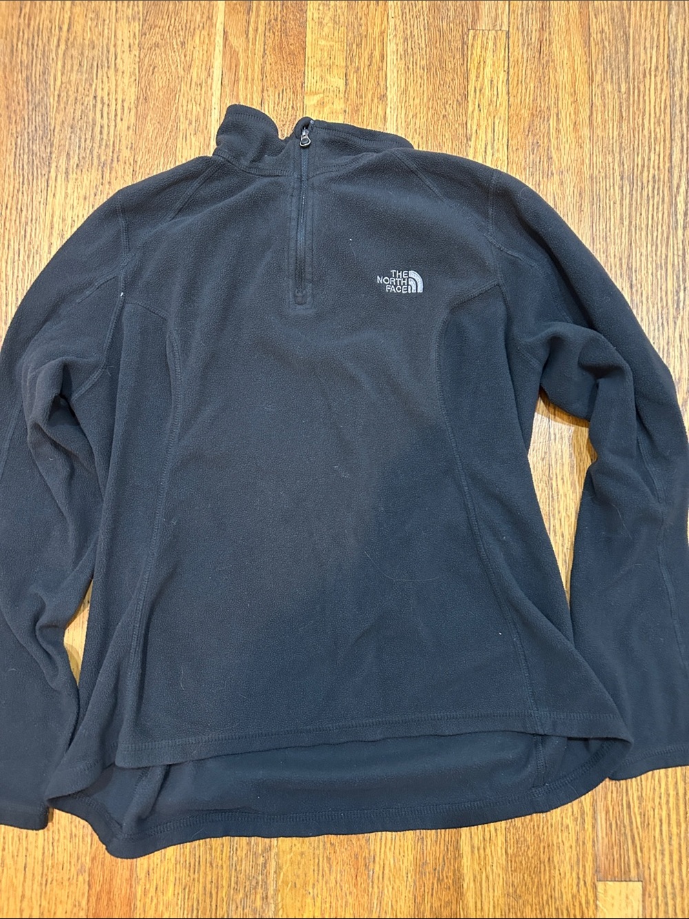 The North Face womens Black Half-Zip Fleece Pullover. Size medium.